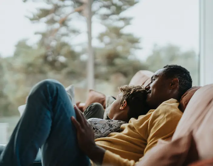 A father and child sharing a quiet moment together.